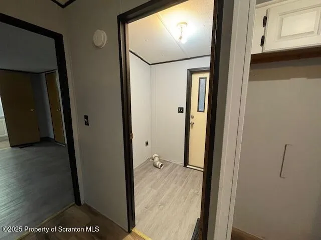 a view of a livingroom from a hallway