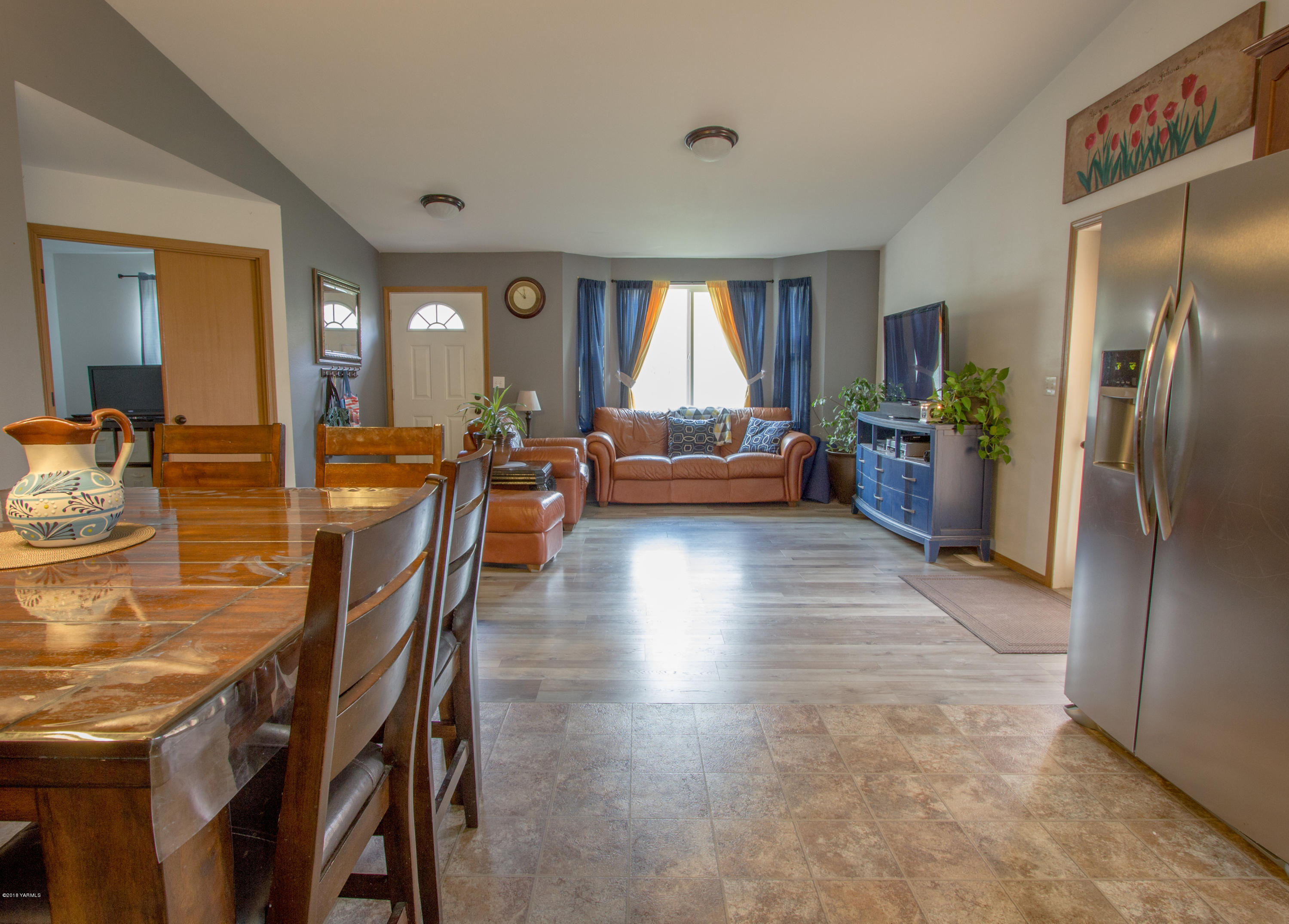 434 West Canyon Road Yakima, WA 98908 - Photo 10 of 23 a view of a dining room with furniture window and wooden floor