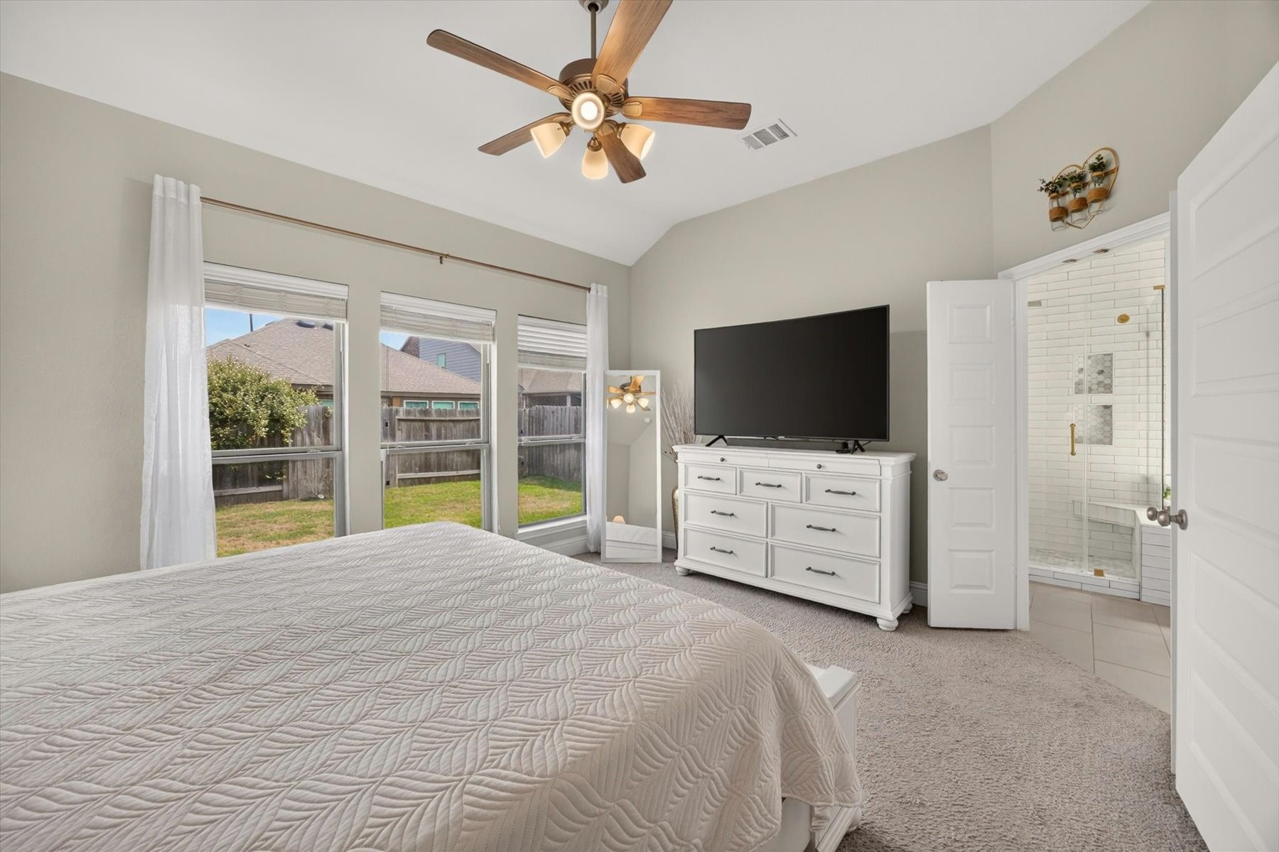 23026 Needle Grass Road Katy, TX 77493 - Photo 18 of 33 Primary retreat featuring a generous walk-in closet and ensuite bath.