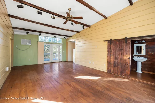 a view of an empty room and window