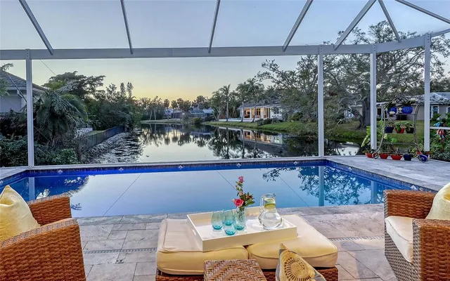 a living room with furniture or couch and a wooden floor