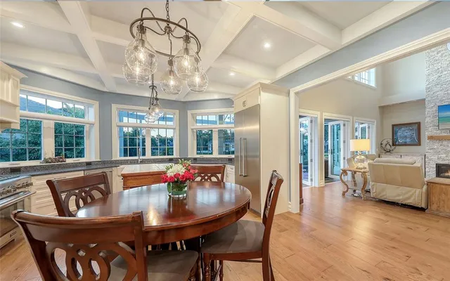 a bathroom with a toilet a sink and a mirror
