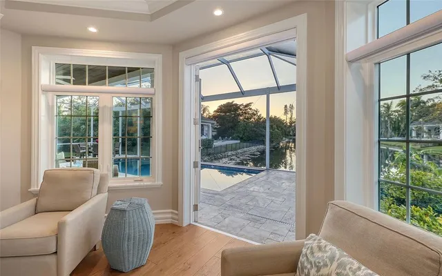 a view of house with backyard and garden