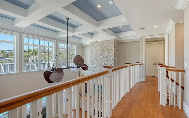 a bathroom with a sink mirror and vanity