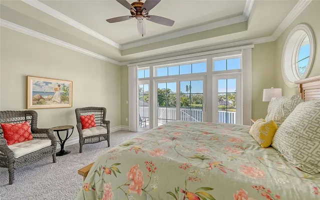 a view of a hallway with a livingroom and furniture