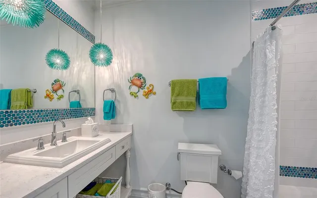 a view of swimming pool with outdoor seating