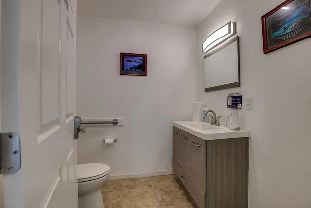 a view of a park with an ocean view