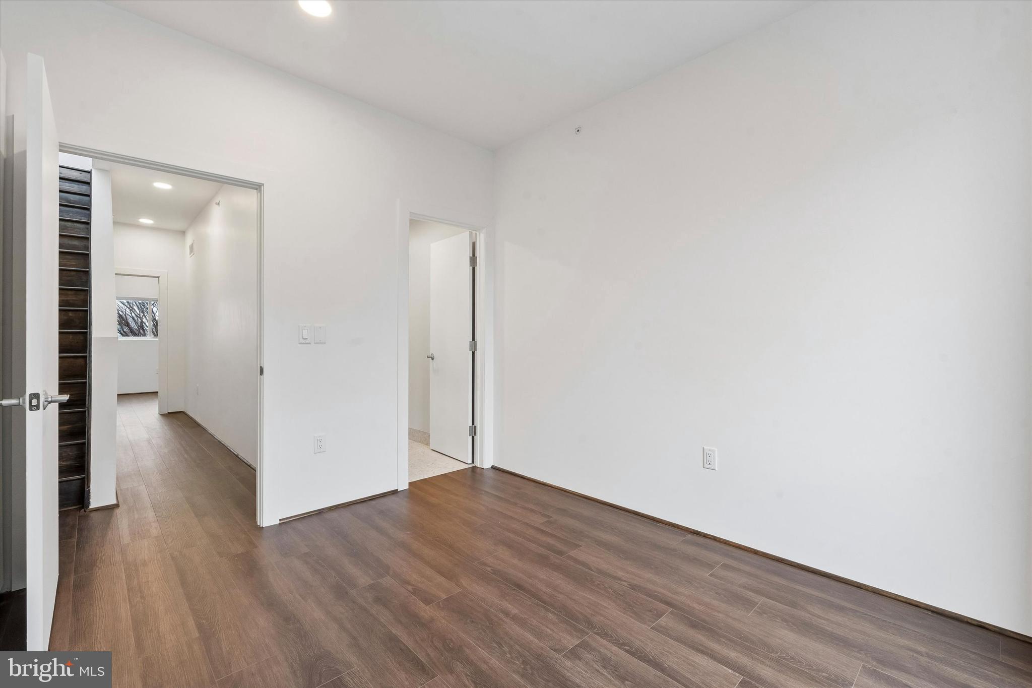 1911 North 9th Street, Unit 2 Philadelphia, PA 19122 - Photo 14 of 18 a view of a room with wooden floor