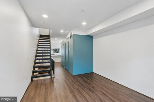 a view of entryway with wooden floor