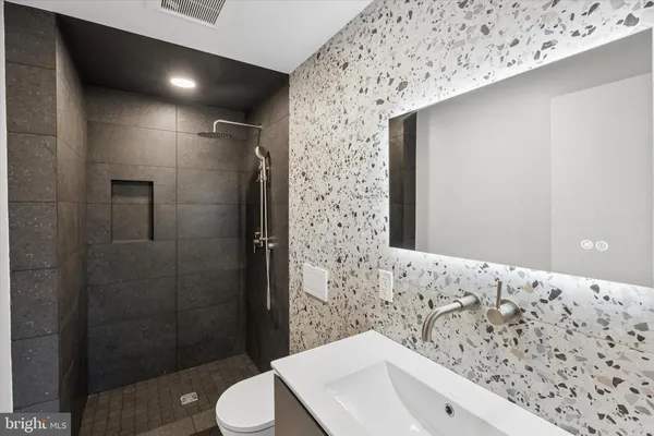 a bathroom with a sink and a toilet