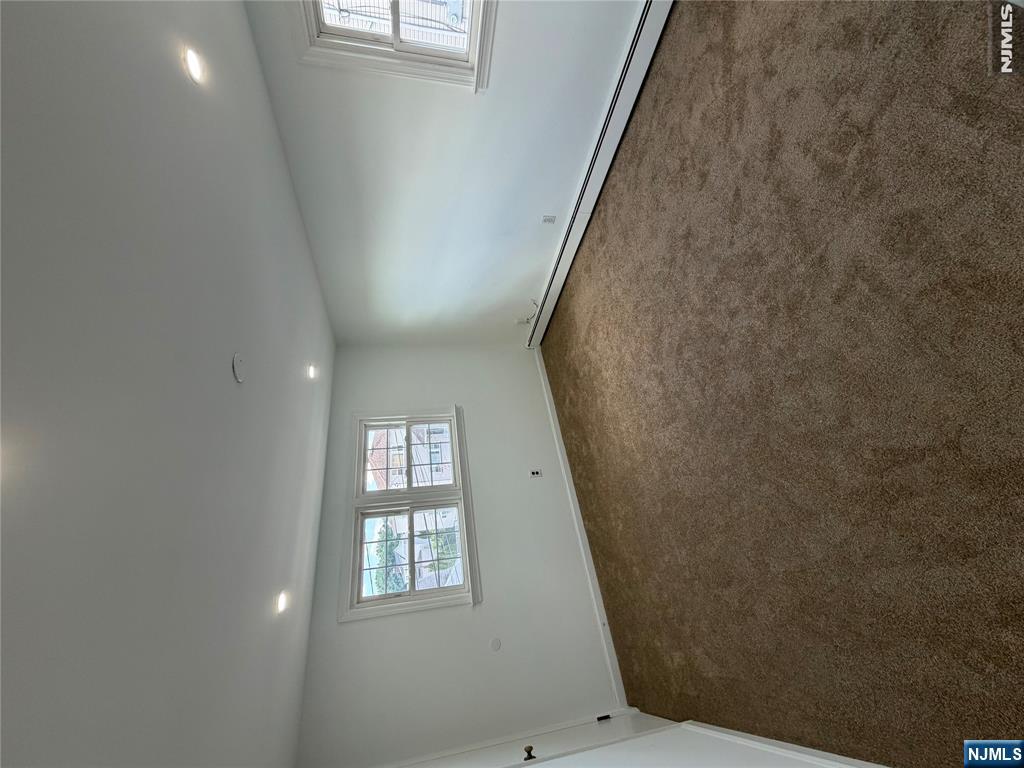 53 Devon Terrace, Unit 2 Kearny, NJ 07032 - Photo 14 of 15 an empty room with windows