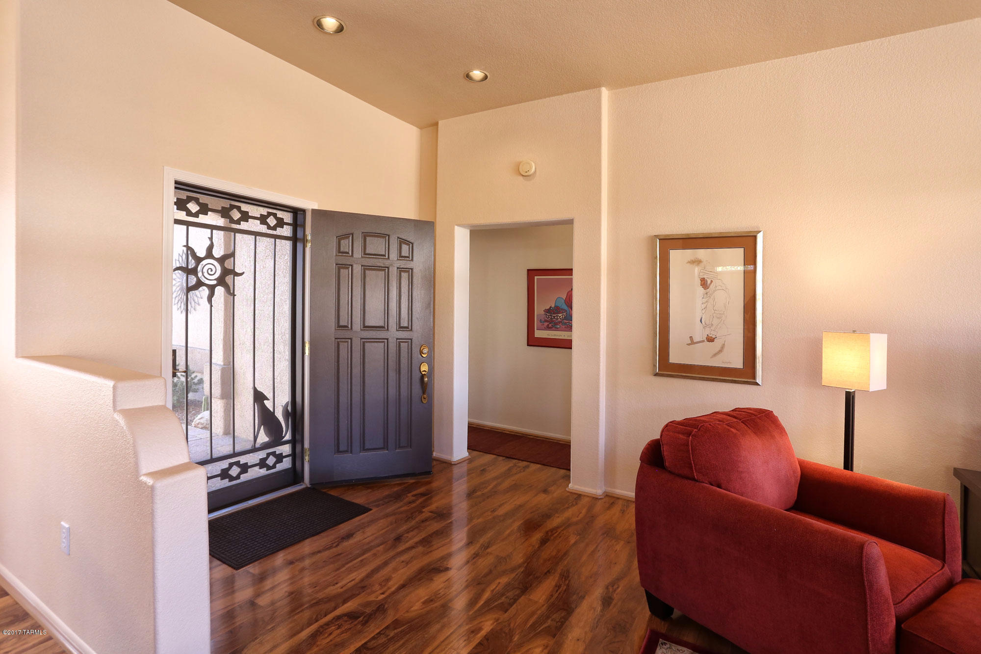 1065 East Royal Oak Road Oro Valley, AZ 85755 - Photo 5 of 19 a bedroom with furniture and a potted plant