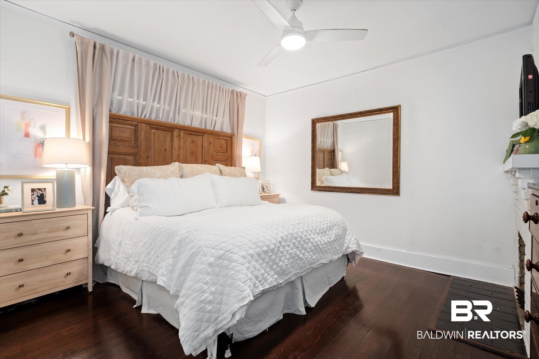 115 Bienville Avenue Mobile, AL 36606 - Photo 9 of 19 Bedroom featuring dark hardwood / wood-style flooring and ceiling fan