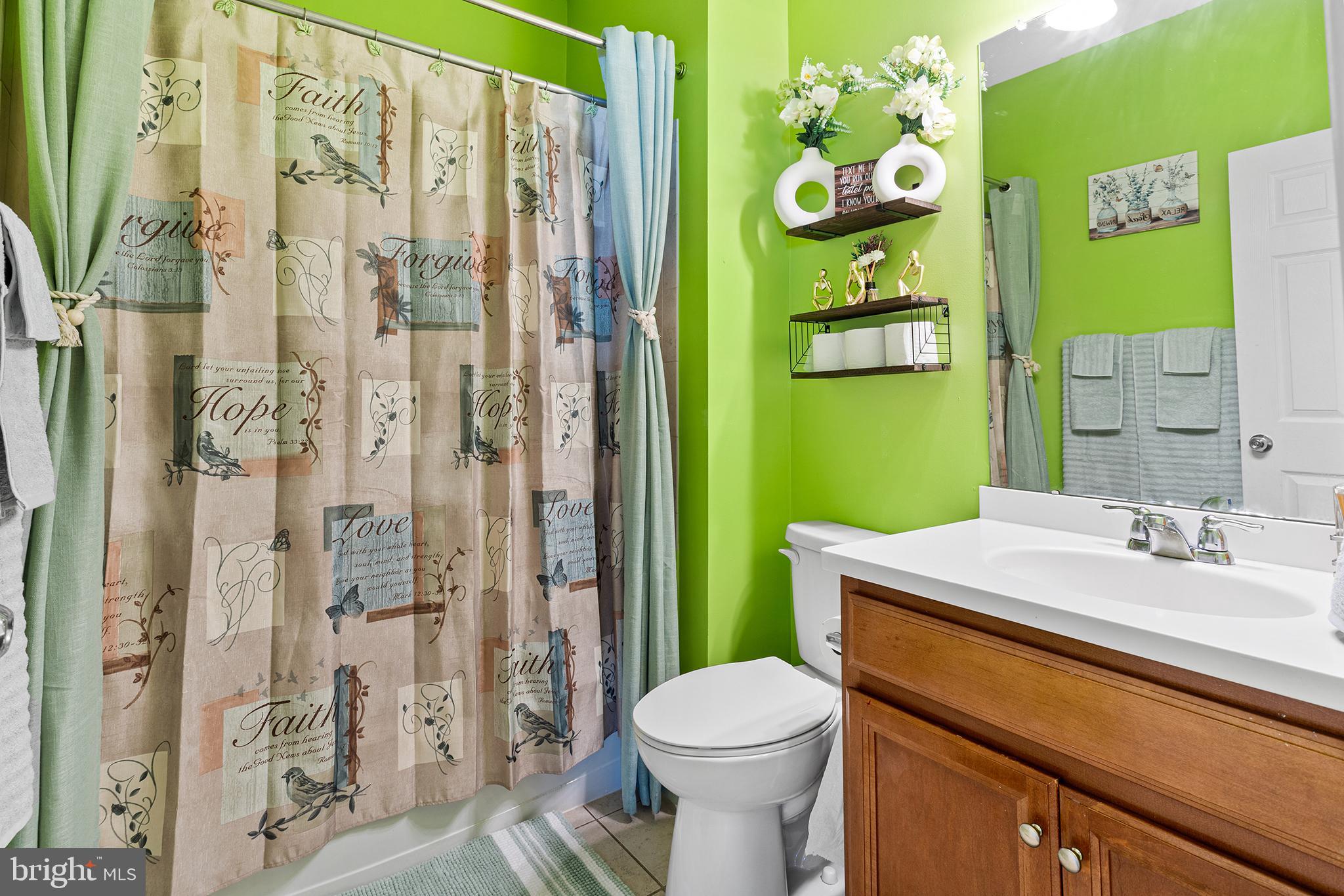 323 Pigott Drive Florence, NJ 08518 - Photo 12 of 36 a bathroom with a sink a toilet and shower