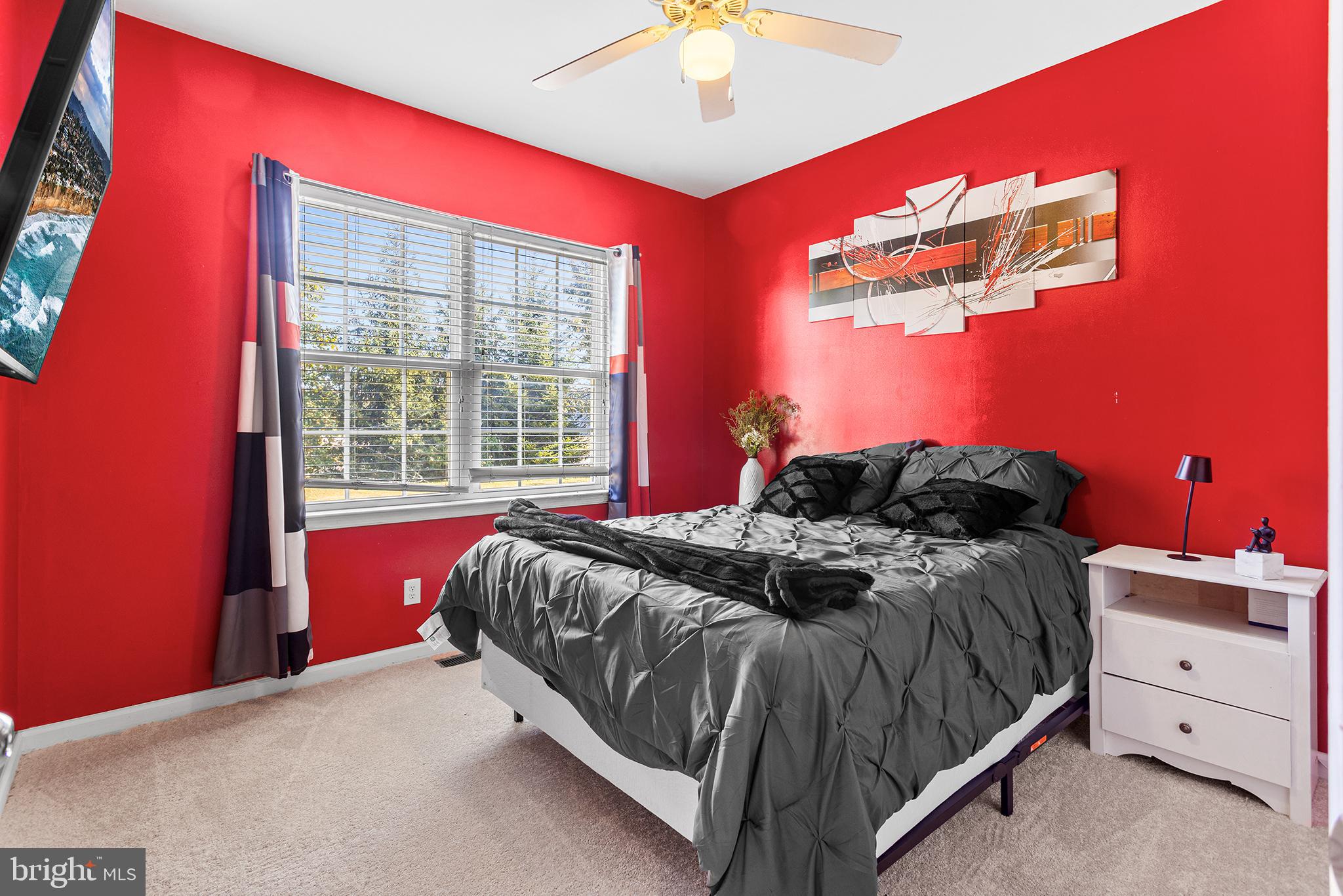 323 Pigott Drive Florence, NJ 08518 - Photo 13 of 36 a bedroom with a bed and a window