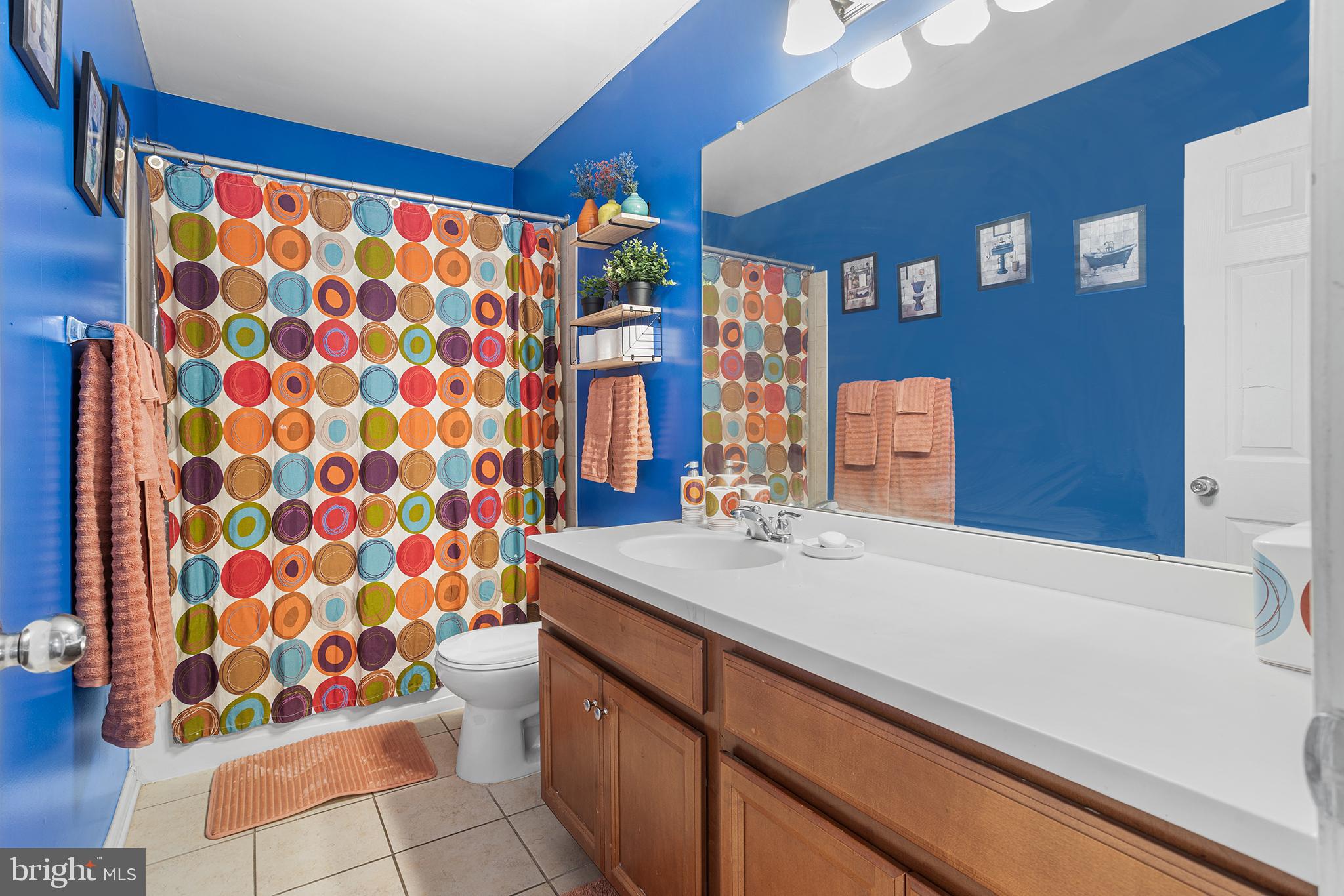 323 Pigott Drive Florence, NJ 08518 - Photo 17 of 36 a bathroom with a sink and a shower