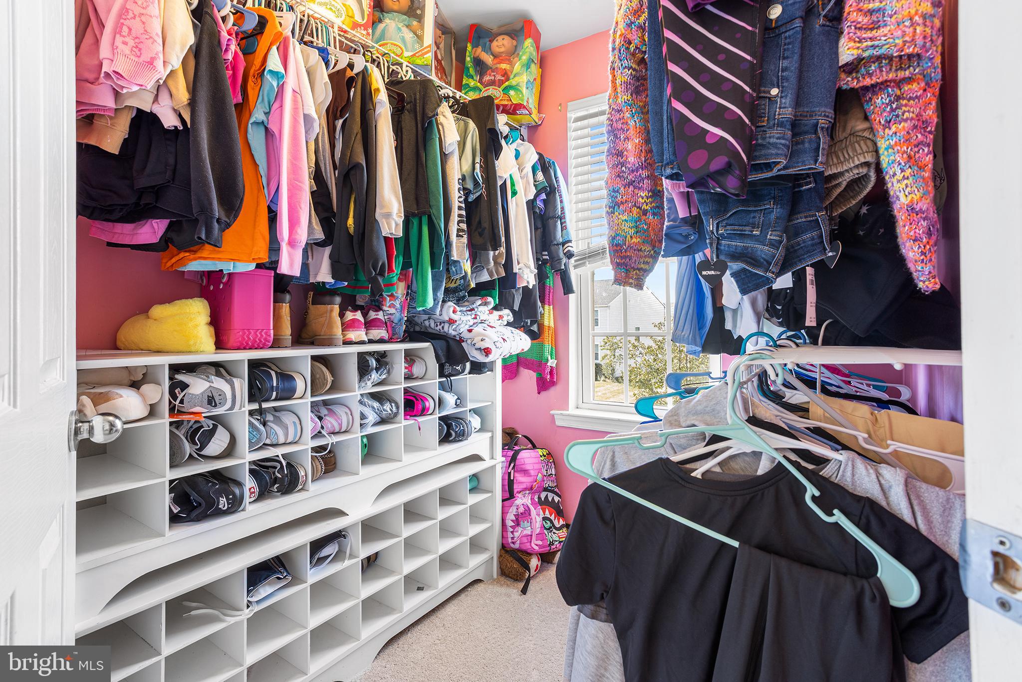 323 Pigott Drive Florence, NJ 08518 - Photo 22 of 36 a view of walk in closet with clothes and shoes