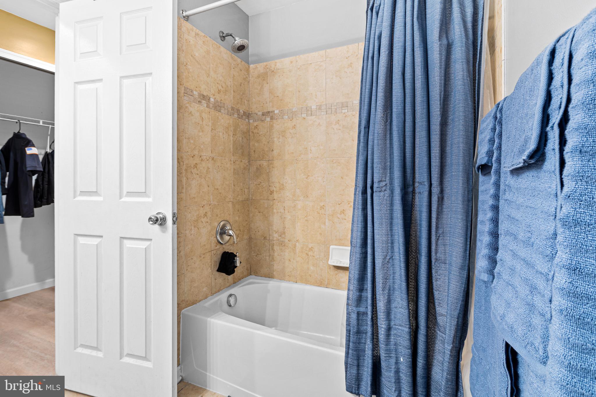 323 Pigott Drive Florence, NJ 08518 - Photo 29 of 36 a bathroom with a tub a sink and a shower