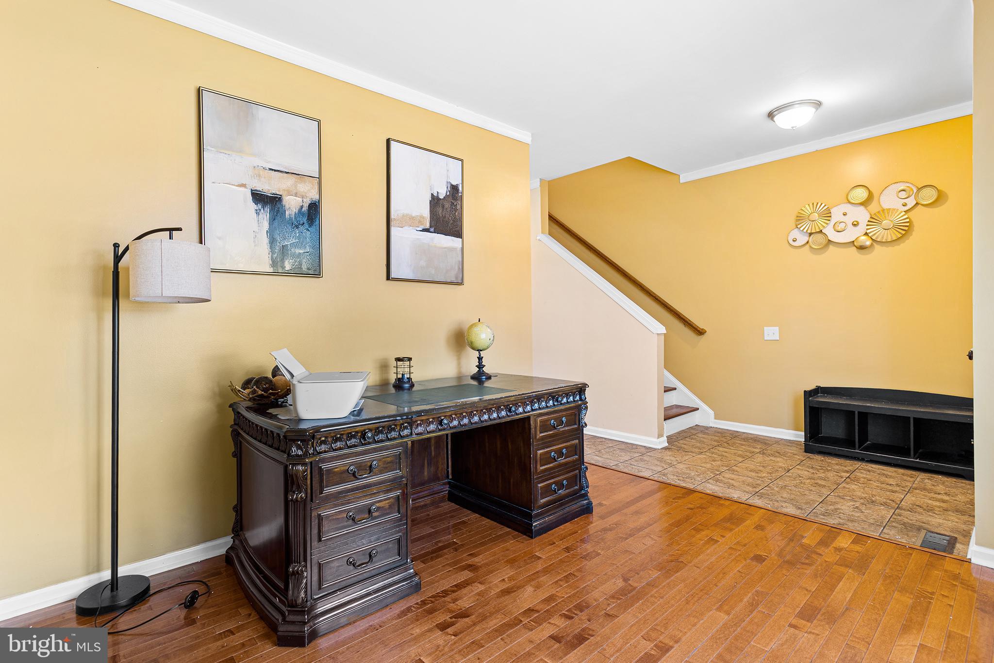 323 Pigott Drive Florence, NJ 08518 - Photo 3 of 36 a view of a workspace with furniture and a flat screen tv