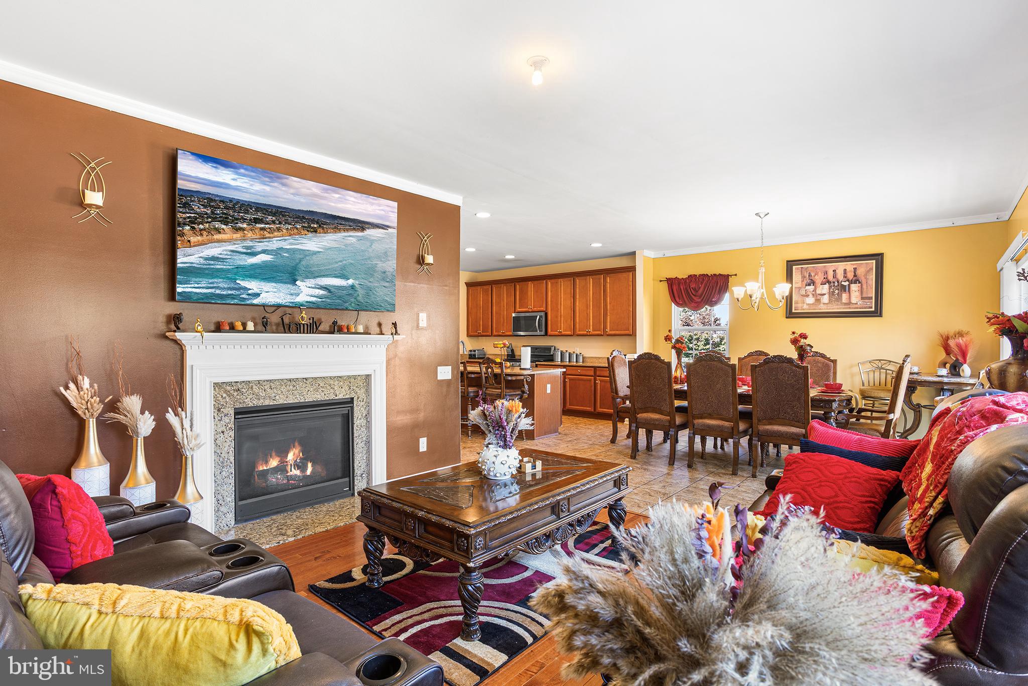 323 Pigott Drive Florence, NJ 08518 - Photo 10 of 36 a living room with furniture fireplace and window