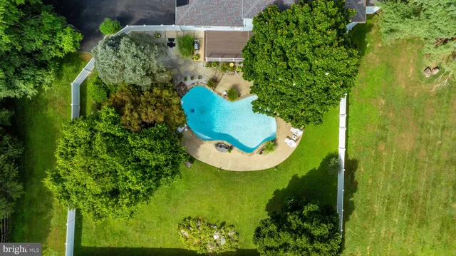 an aerial view of a swimming pool