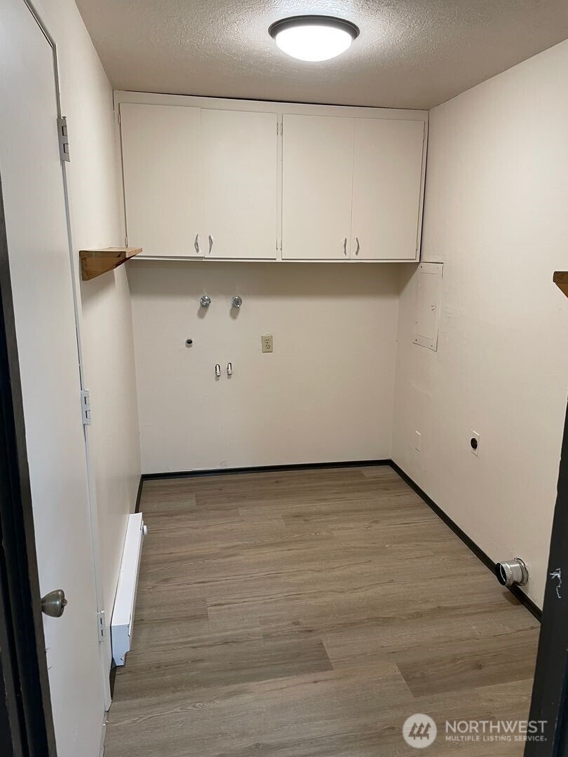 13317 28th Street Northeast, Unit A/B Lake Stevens, WA 98258 - Photo 7 of 14 a view of a utility room with cabinets