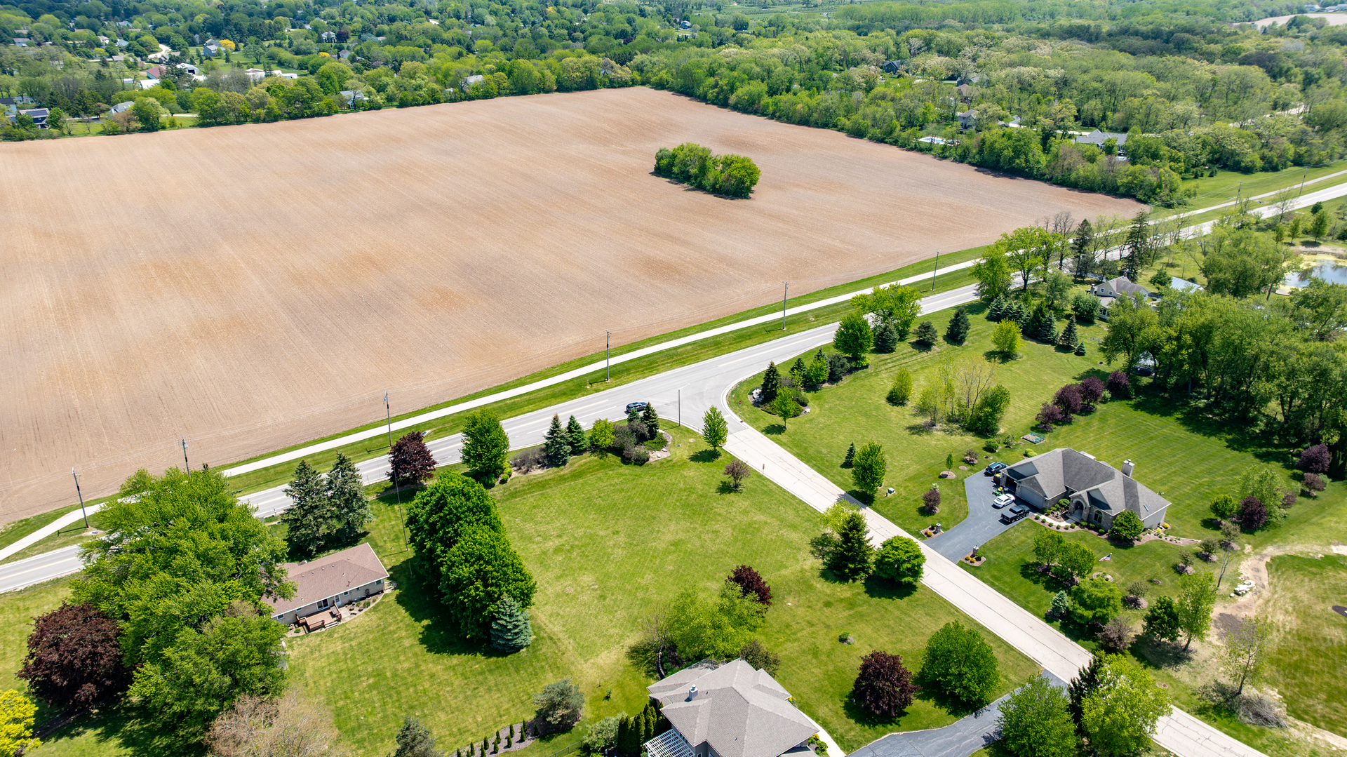 2601 Sanctuary Lane Spring Grove, IL 60081 - Photo 9 of 11 a view of a garden with an outdoor seating area