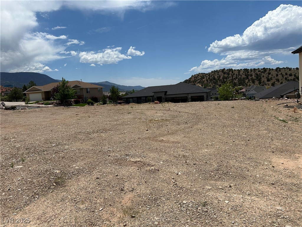 1490 North Knoll Street Cedar City, UT 84721 - Photo 1 of 15 View of yard featuring a mountain view