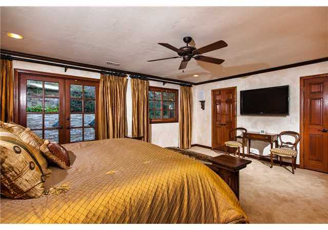 188 Candy Lane Encinitas, CA 92024 - Photo 14 of 25 Master bedroom with french doors leading out to a private patio with wall fountain.