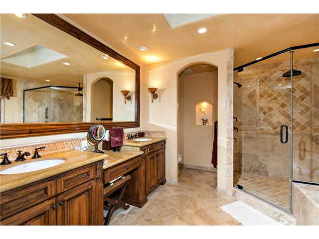 188 Candy Lane Encinitas, CA 92024 - Photo 15 of 25 Master bath with granite counters, travertine floors, spa tub, operable skylight and large, stone shower.