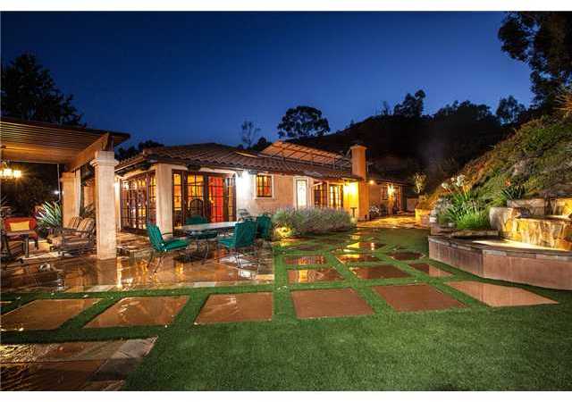 188 Candy Lane Encinitas, CA 92024 - Photo 3 of 25 Backyard with pergola, multiple seating areas, fountains and mature landscaping.