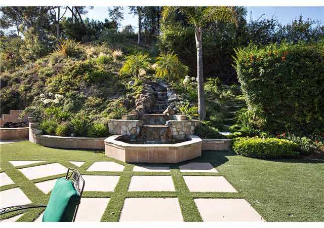 188 Candy Lane Encinitas, CA 92024 - Photo 22 of 25 Backyard and stone waterfall.