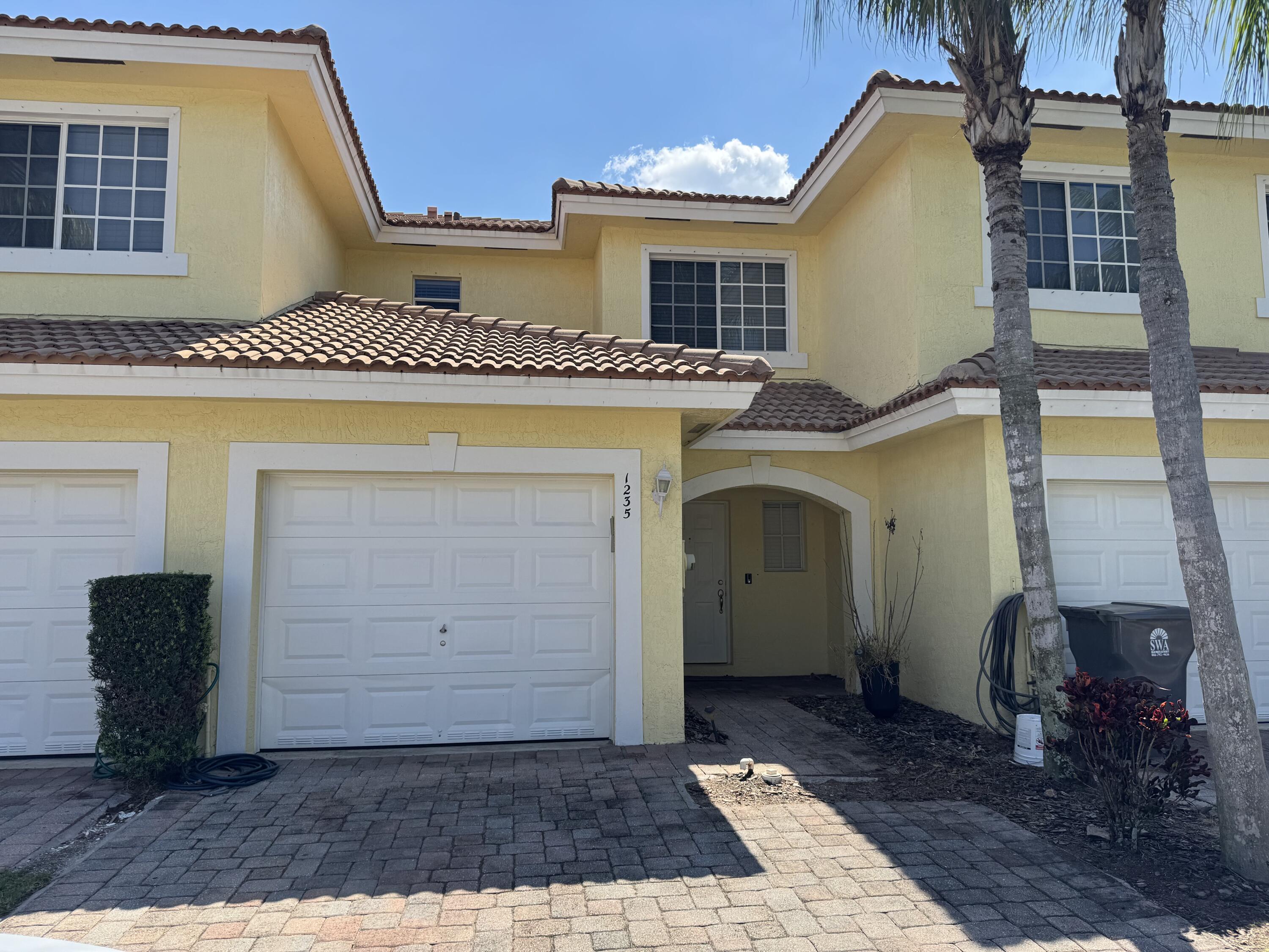 1235 Imperial Lake Road West Palm Beach, FL 33413 - Photo 1 of 18 front view