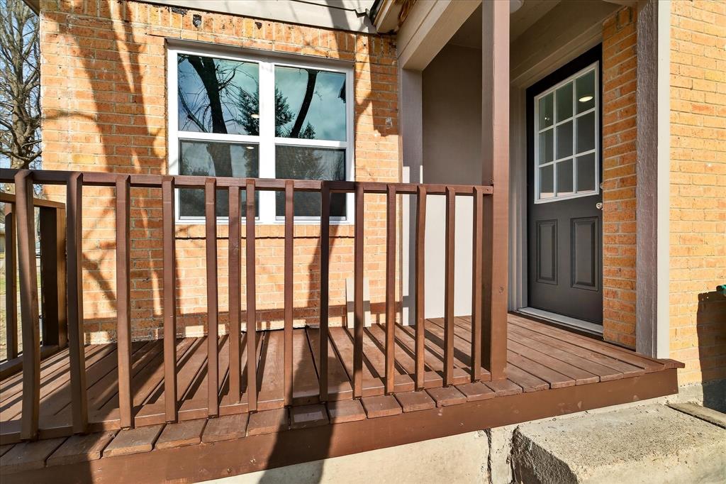 806 Denton Street Denton, TX 76201 - Photo 16 of 19 View of exterior entry featuring brick siding