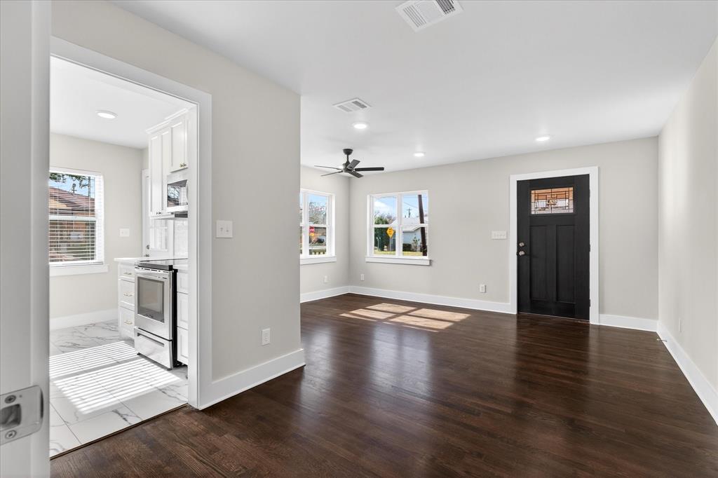 806 Denton Street Denton, TX 76201 - Photo 6 of 19 Entryway featuring ceiling fan, dark wood-type flooring, and recessed lighting