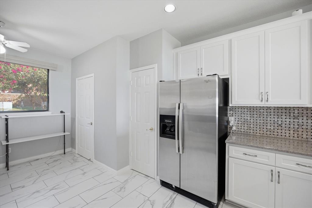1846 Signal Ridge Place, Unit B4 Rockwall, TX 75032 - Photo 18 of 27 Kitchen includes breakfast area and pantry