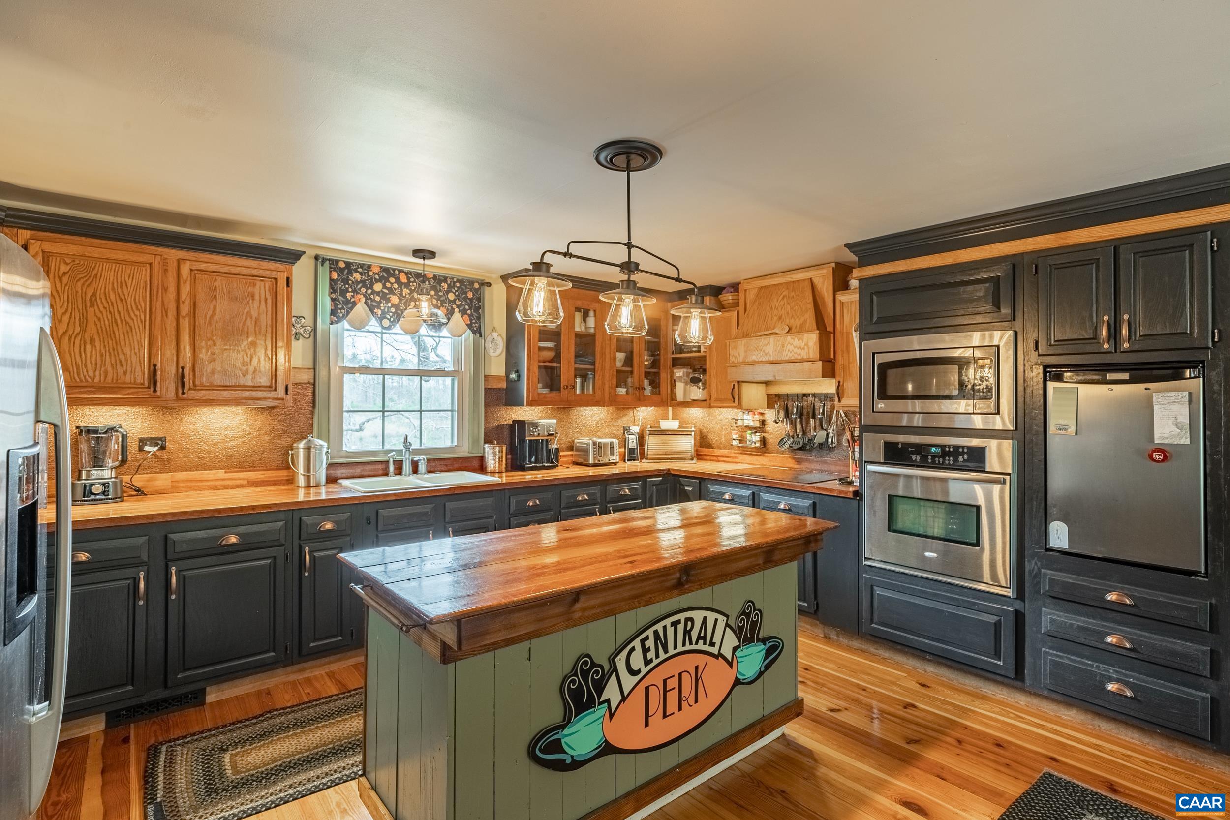 3100 Bacon School Road Saxe, VA 23967 - Photo 13 of 47 a kitchen with a stove and a sink