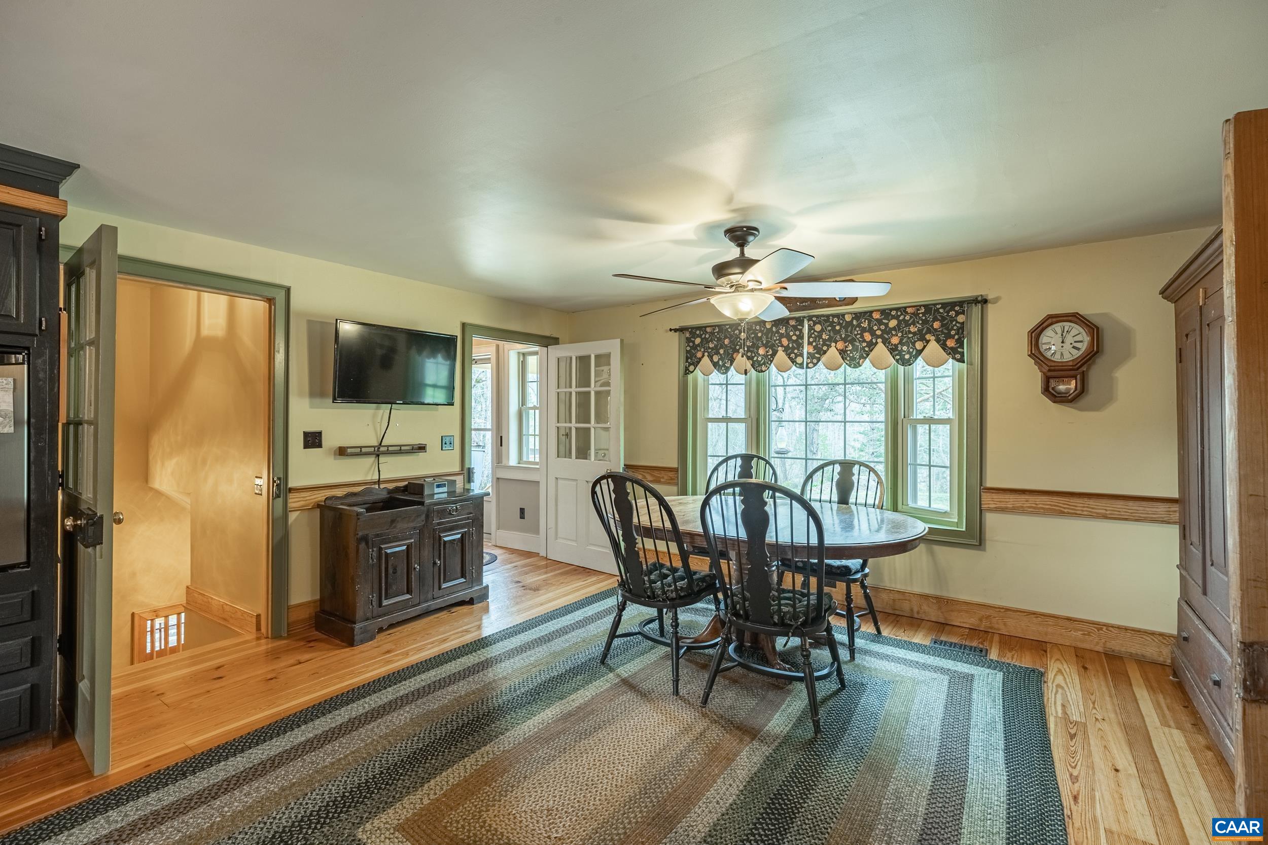 3100 Bacon School Road Saxe, VA 23967 - Photo 19 of 47 a view of a dining room with furniture window and wooden floor