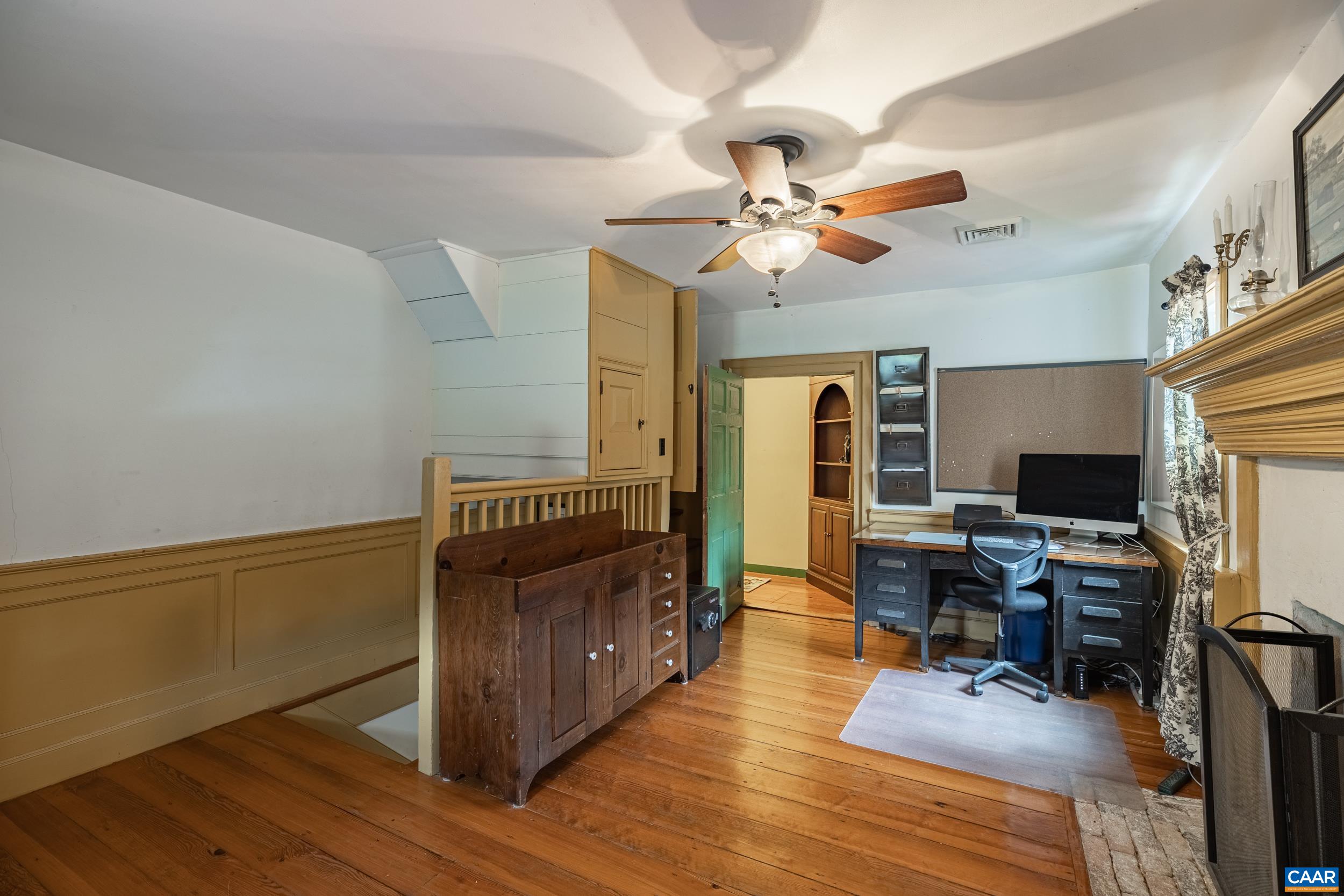 3100 Bacon School Road Saxe, VA 23967 - Photo 29 of 47 a living room with furniture and a flat screen tv