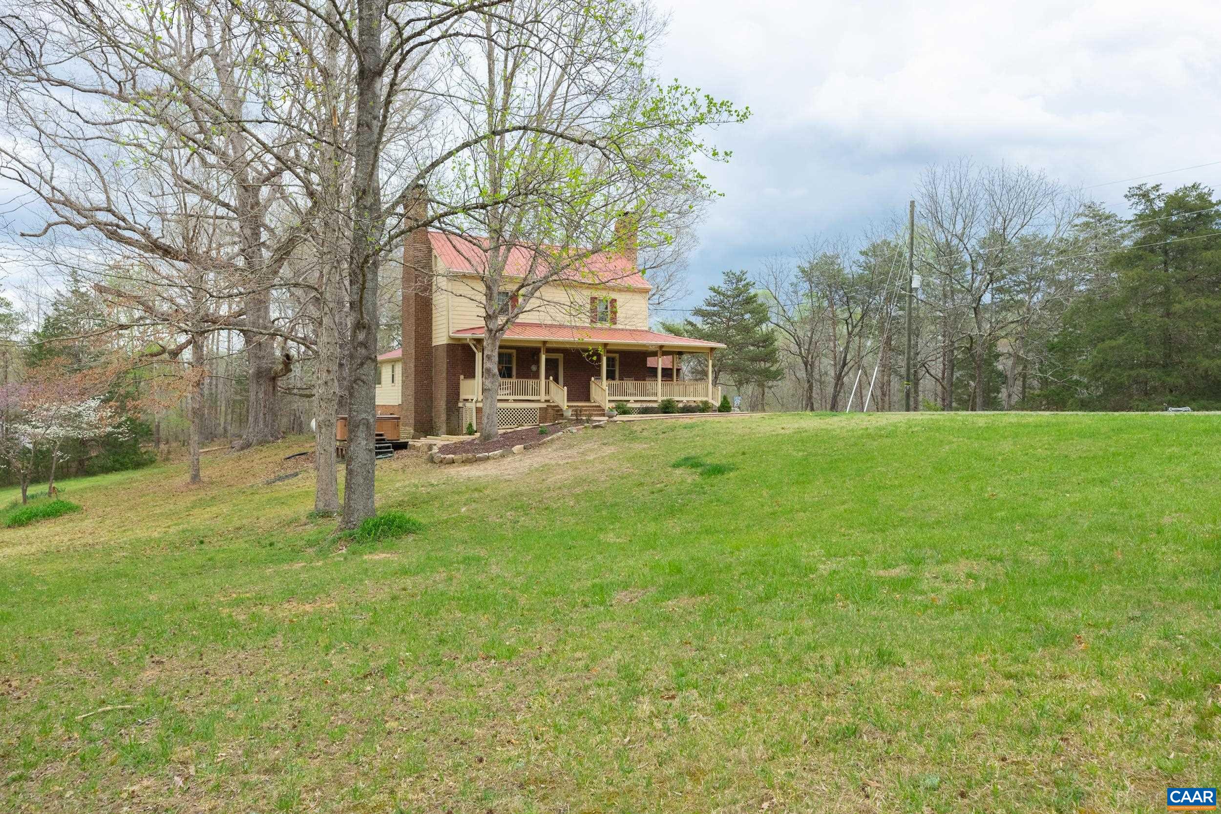 3100 Bacon School Road Saxe, VA 23967 - Photo 33 of 47 a view of a house with a big yard and large trees