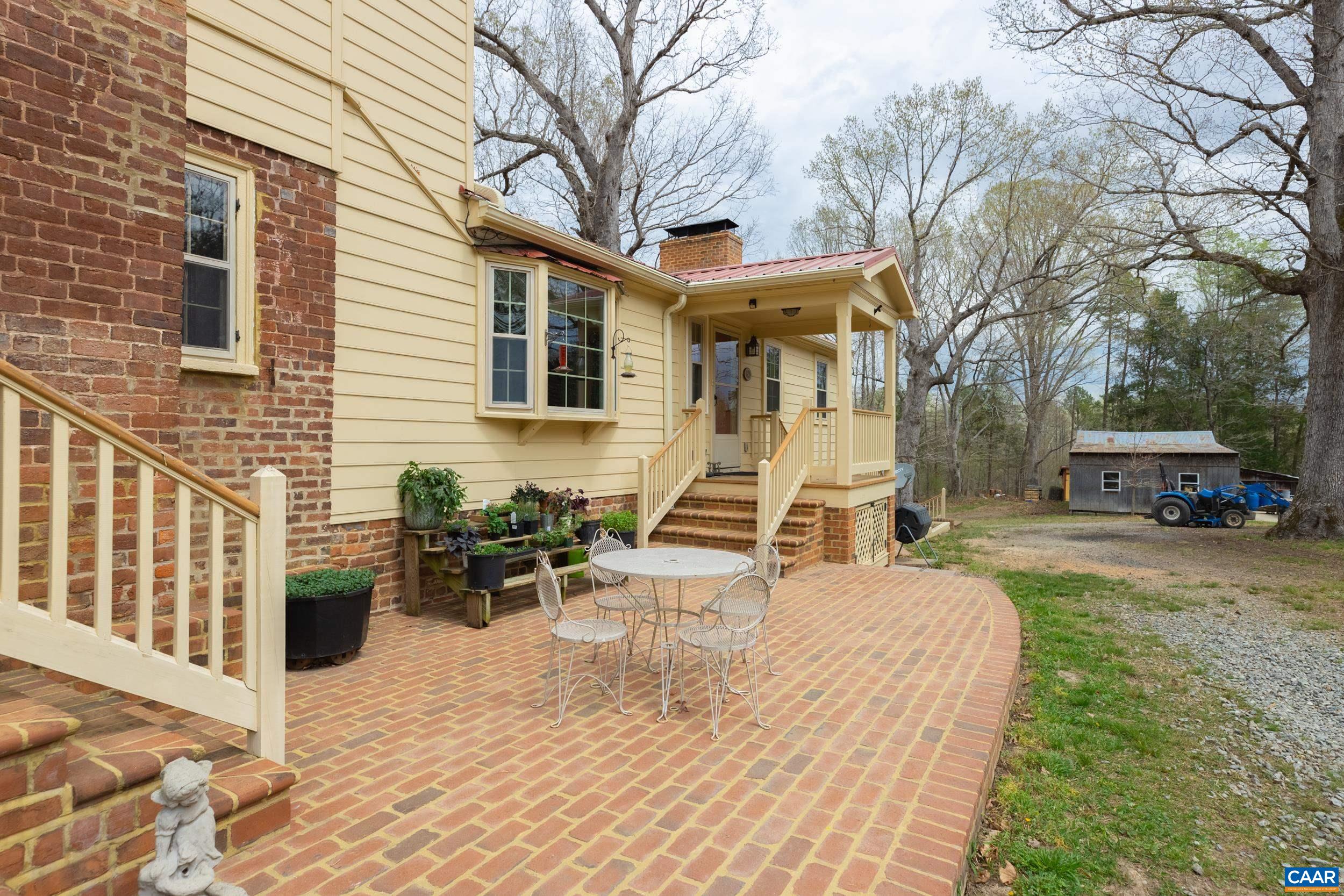 3100 Bacon School Road Saxe, VA 23967 - Photo 34 of 47 a view of a building with sitting area and furniture