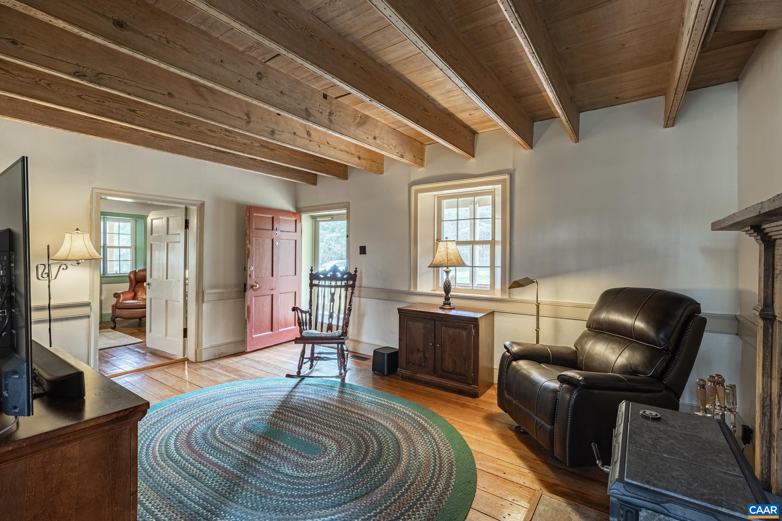 3100 Bacon School Road Saxe, VA 23967 - Photo 5 of 47 a living room with furniture and a fireplace