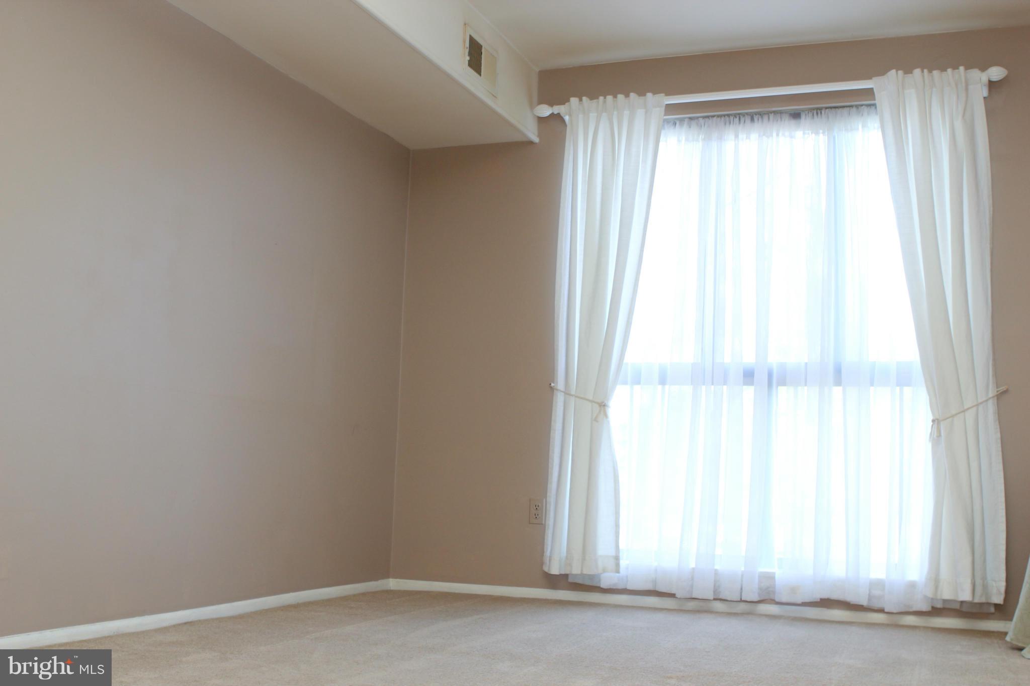 2010 Colts Neck Road, Unit 21B Reston, VA 20191 - Photo 13 of 25 a view of a window in a room