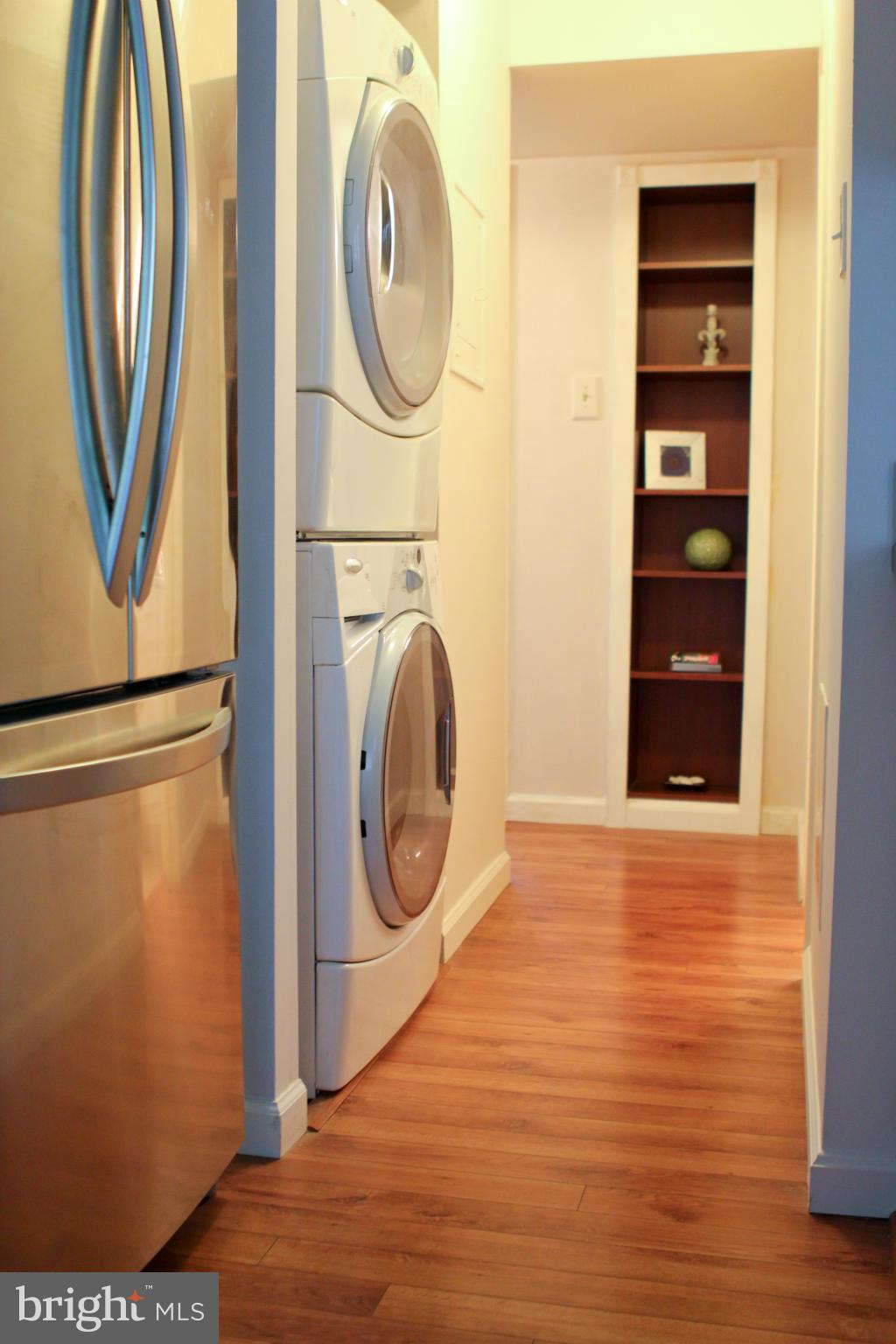 2010 Colts Neck Road, Unit 21B Reston, VA 20191 - Photo 19 of 25 a view of a storage & utility room with washer and dryer