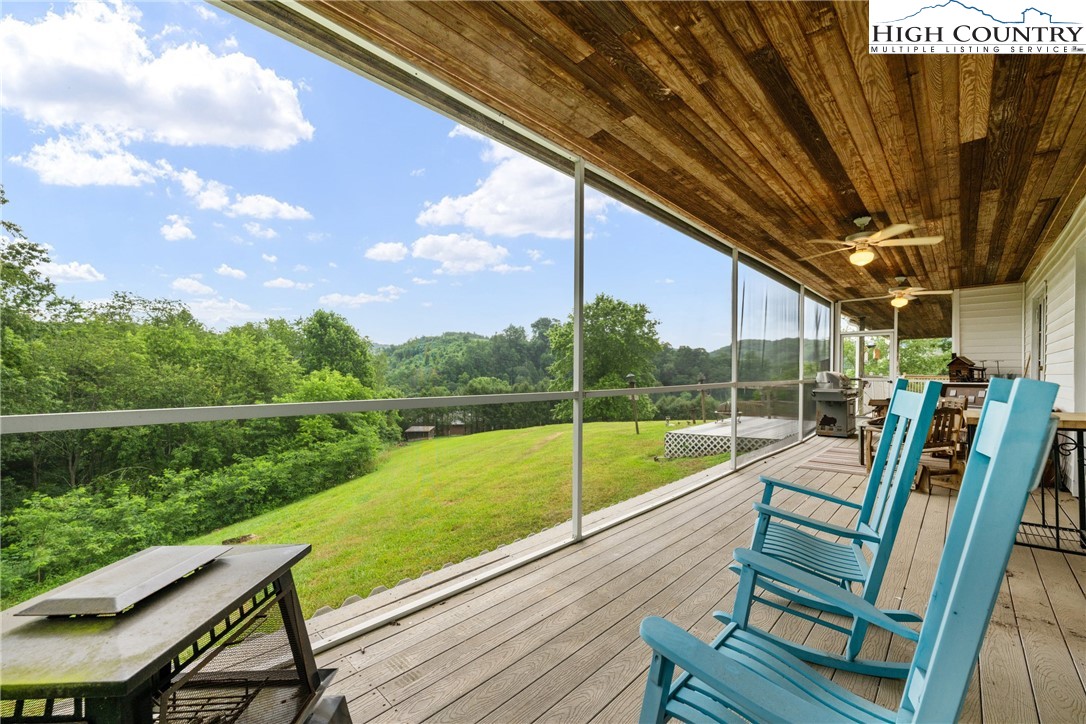 175 Olive Ridge Drive Crumpler, NC 28617 - Photo 44 of 50 a view of a chairs and table in the balcony