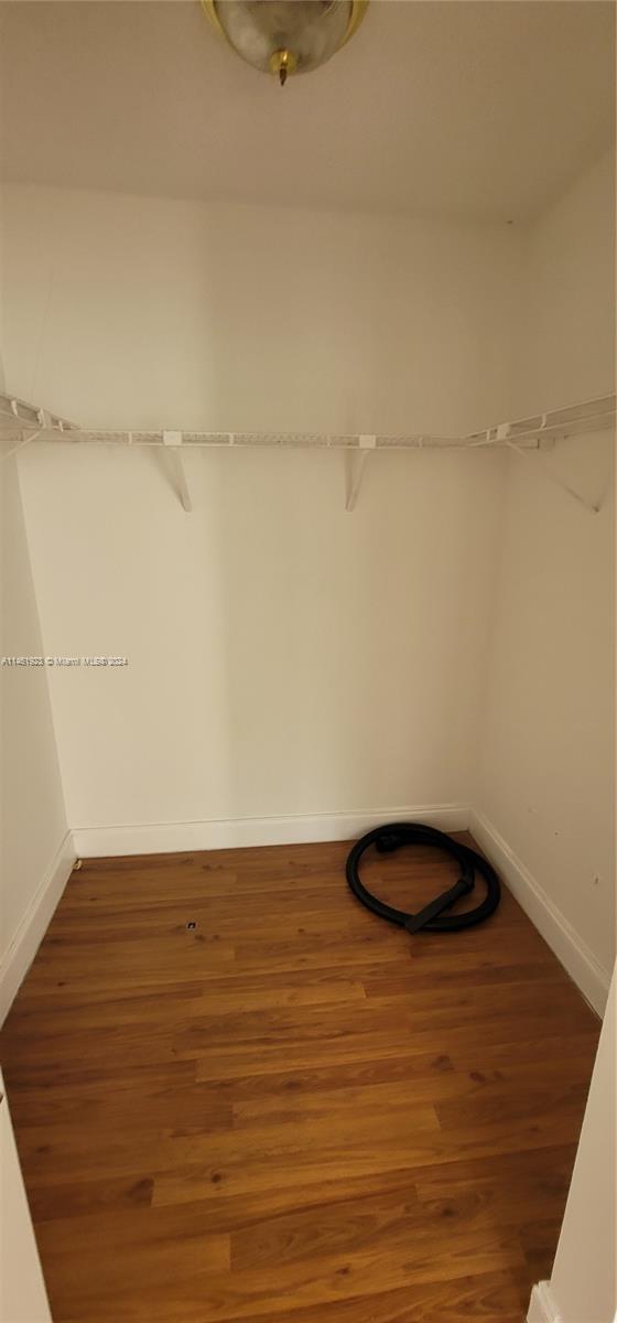 17021 North Bay Road, Unit 516 Sunny Isles Beach, FL 33160 - Photo 4 of 10 a view of small space with racks on the wall