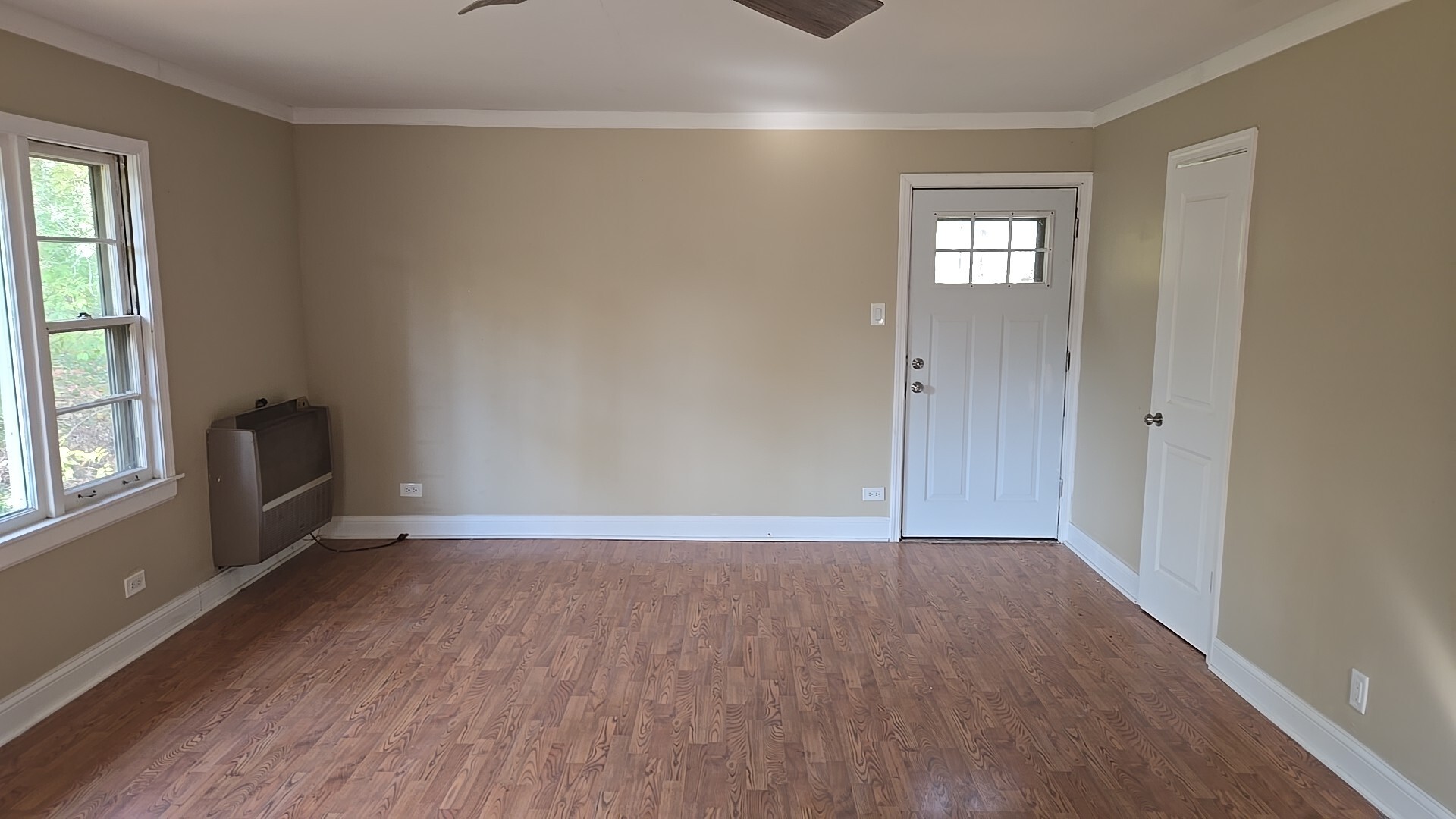 710 Bruce Avenue Flossmoor, IL 60422 - Photo 12 of 20 an empty room with wooden floor and windows
