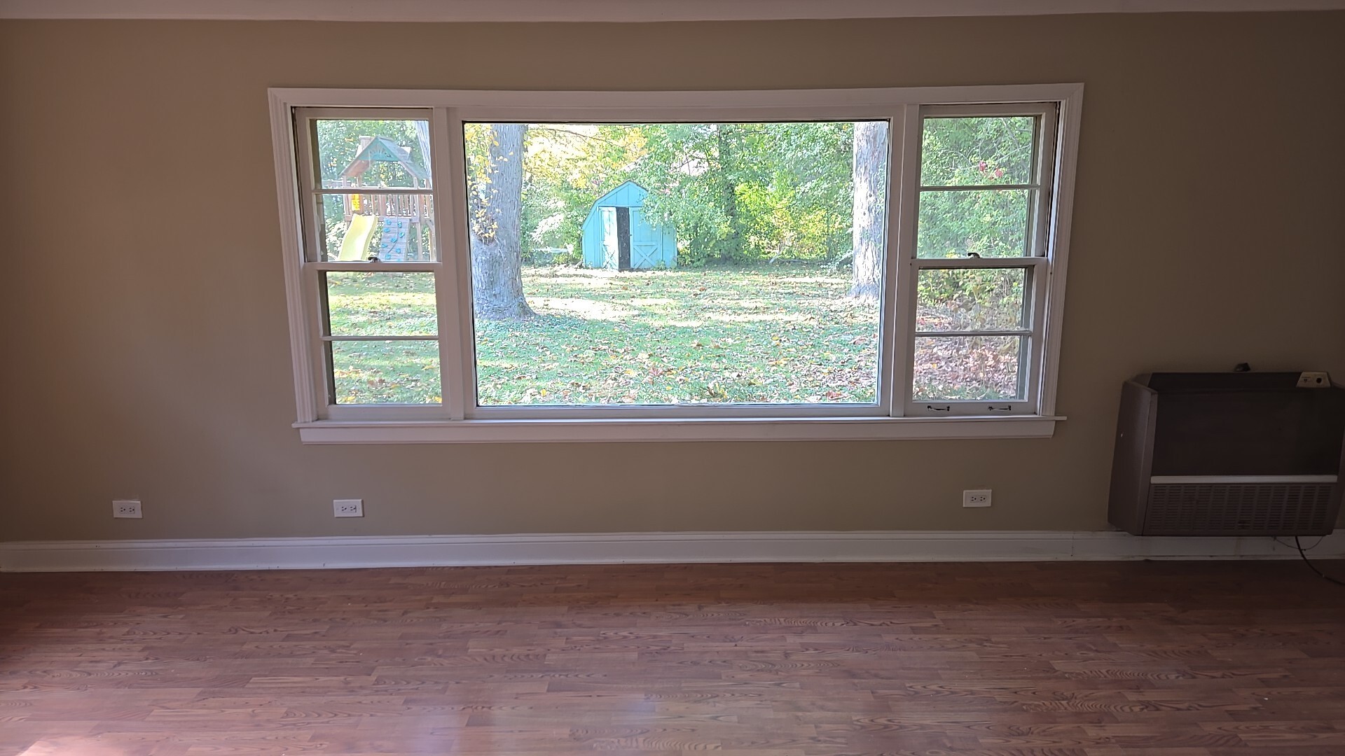 710 Bruce Avenue Flossmoor, IL 60422 - Photo 13 of 20 a view of a livingroom with an empty space and a window