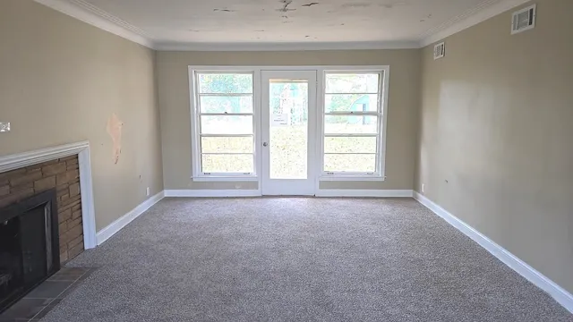 an empty room with windows