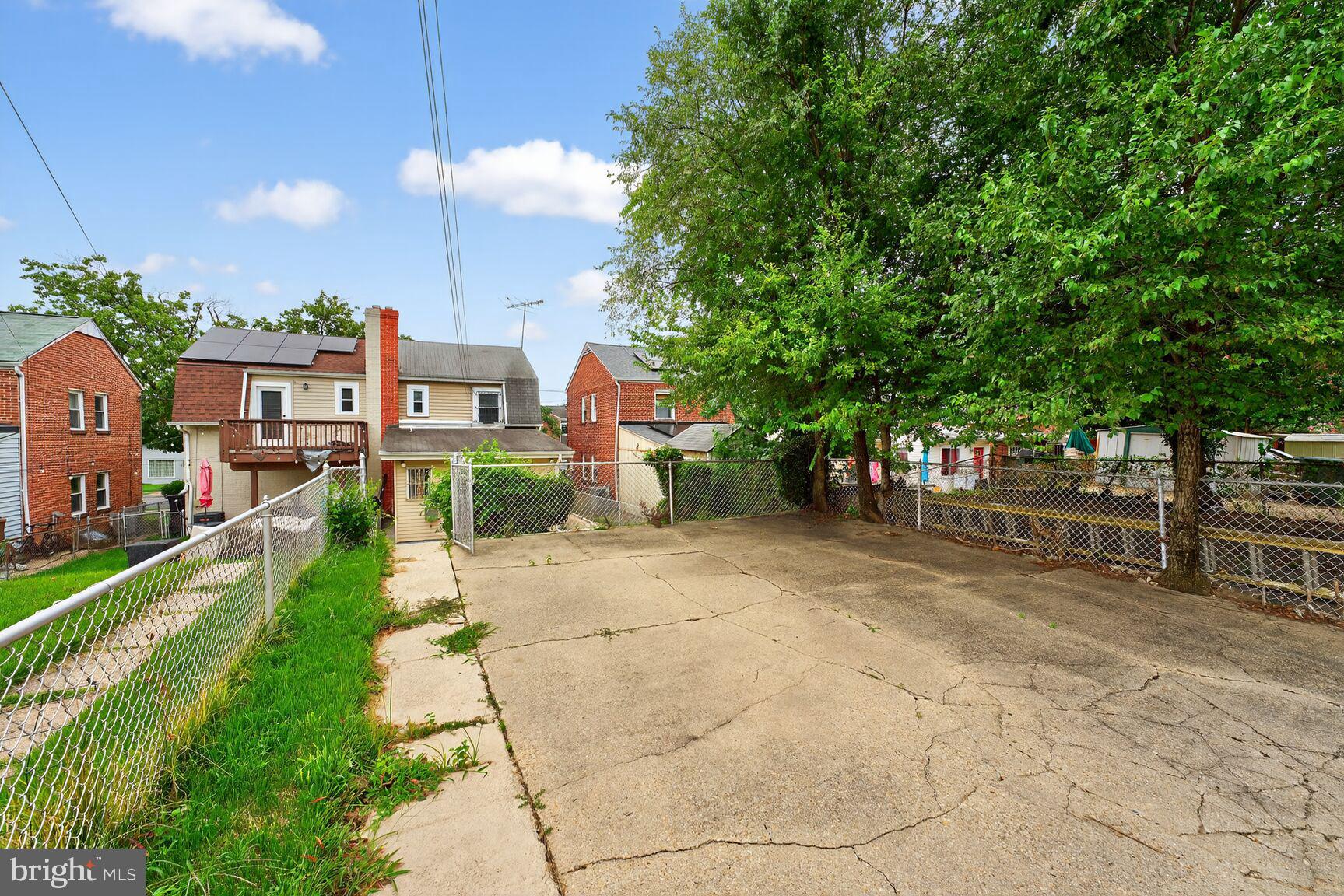 5720 5th Street Northeast Washington, DC 20011 - Photo 20 of 24 a view of a street both of side of the house